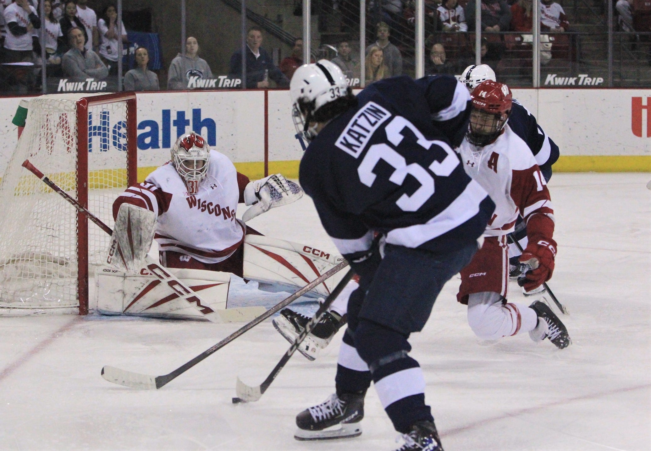 Wisconsin goaltender Daniel Hauser prepares to make save on a shot by Penn State's Lev Katzin during the second period of their game Jan. 24 at the Kohl Center.