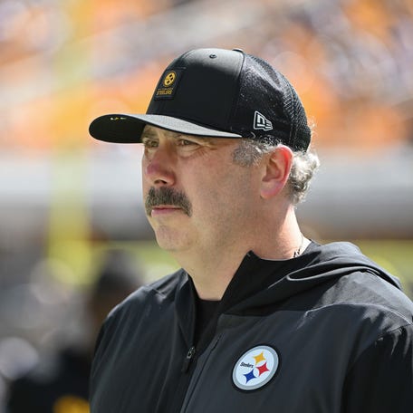 Pittsburgh Steelers offensive coordinator Arthur Smith walks the sideline before a game against the Seattle Seahawks at Acrisure Stadium.