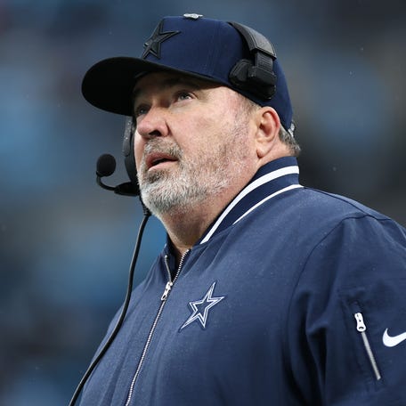 Head coach Mike McCarthy of the Dallas Cowboys looks on during the fourth quarter against the Carolina Panthers at Bank of America Stadium on December 15, 2024 in Charlotte, North Carolina.