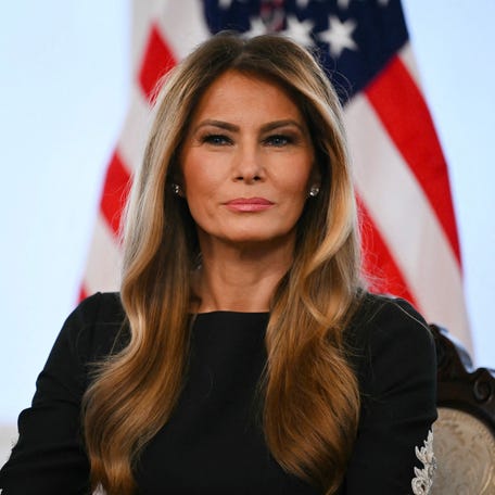 First lady Melania Trump participates in calls to US service members, on Christmas Eve, from the Mar-a-Lago club in Palm Beach, Florida, December 24, 2025. (Photo by ANDREW CABALLERO-REYNOLDS / AFP via Getty Images)