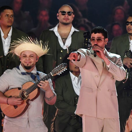 Puerto Rican rapper Bad Bunny (R) performs during his "Debi tirar mas fotos" world tour at the Atanasio Girardot Stadium in Medellin, Colombia, on January 23, 2026. (Photo by Jaime SALDARRIAGA / AFP via Getty Images)