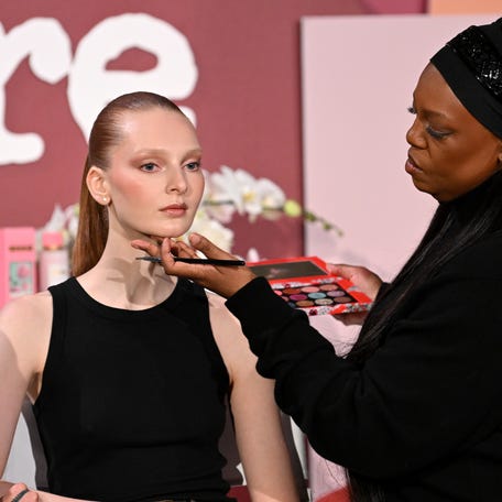 Dame Pat McGrath applies make-up to a model during Allure Best of Beauty: The Live Event at Chelsea Industrial on Oct. 19, 2024, in New York City.
