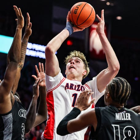 Arizona center Motiejus Krivas (13) shoots the ball during the second half against Cincinnati at McKale Memorial Center.