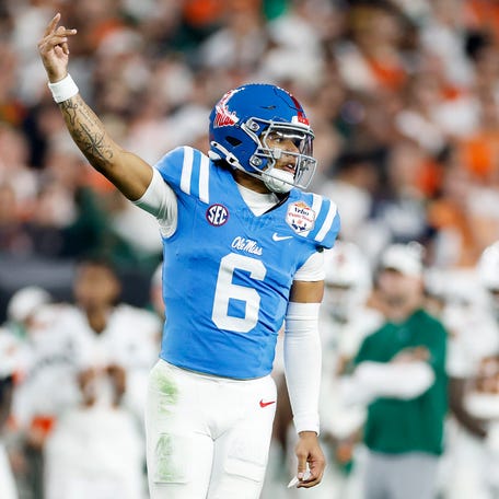 GLENDALE, ARIZONA - JANUARY 08: Trinidad Chambliss #6 of the Ole Miss Rebels celebrates after a two-point conversion against the Miami Hurricanes in the fourth quarter during the 2025 College Football Playoff Semifinal at the VRBO Fiesta Bowl at State Farm Stadium on January 08, 2026 in Glendale, Arizona. (Photo by Ronald Martinez/Getty Images)