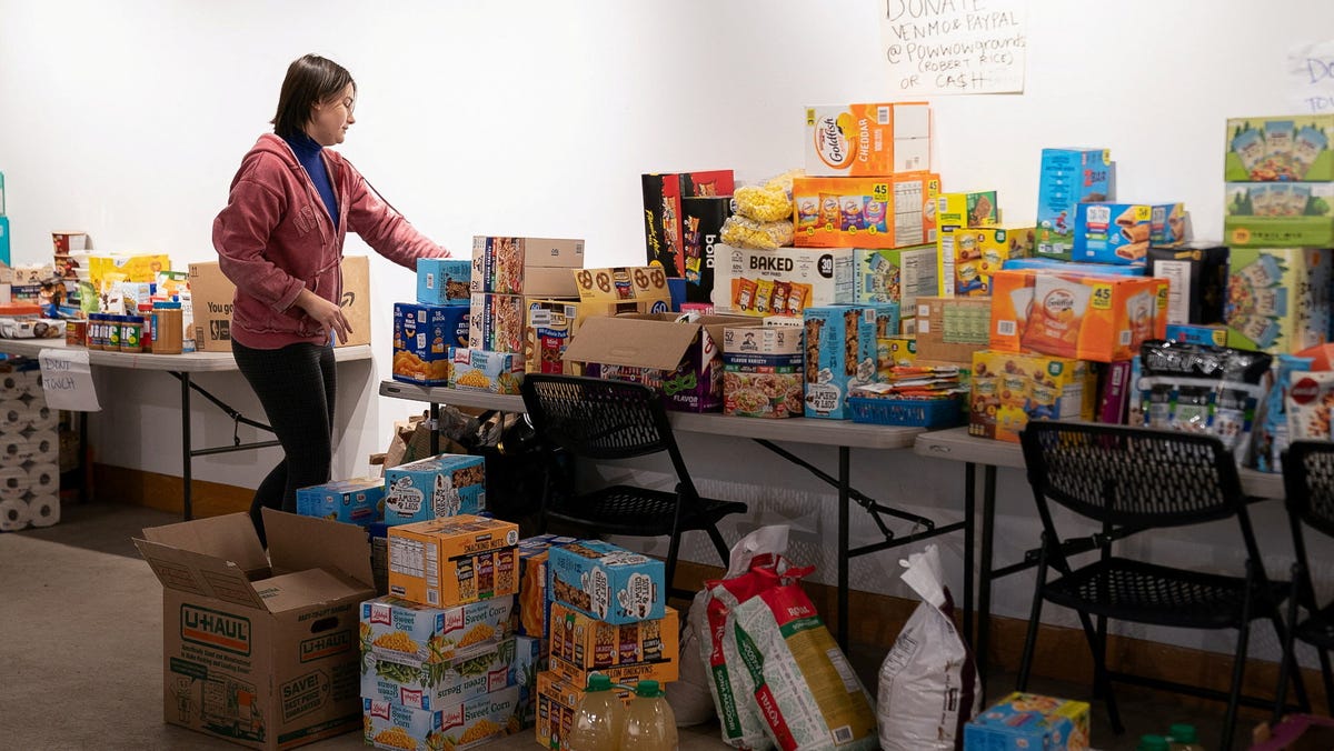 Grace Sontra volunteers at Native-owned coffee shop Pow Wow Grounds during a statewide pause in daily economic activity to protest the U.S. government's surge in immigration enforcement in Minneapolis, Minnesota, on January 23, 2026. The coffee shop has acted as a resource hub coordinated by the Indigenous Protector Movement for donations and community care as ICE operations have escalated. REUTERS/Erica Dischino