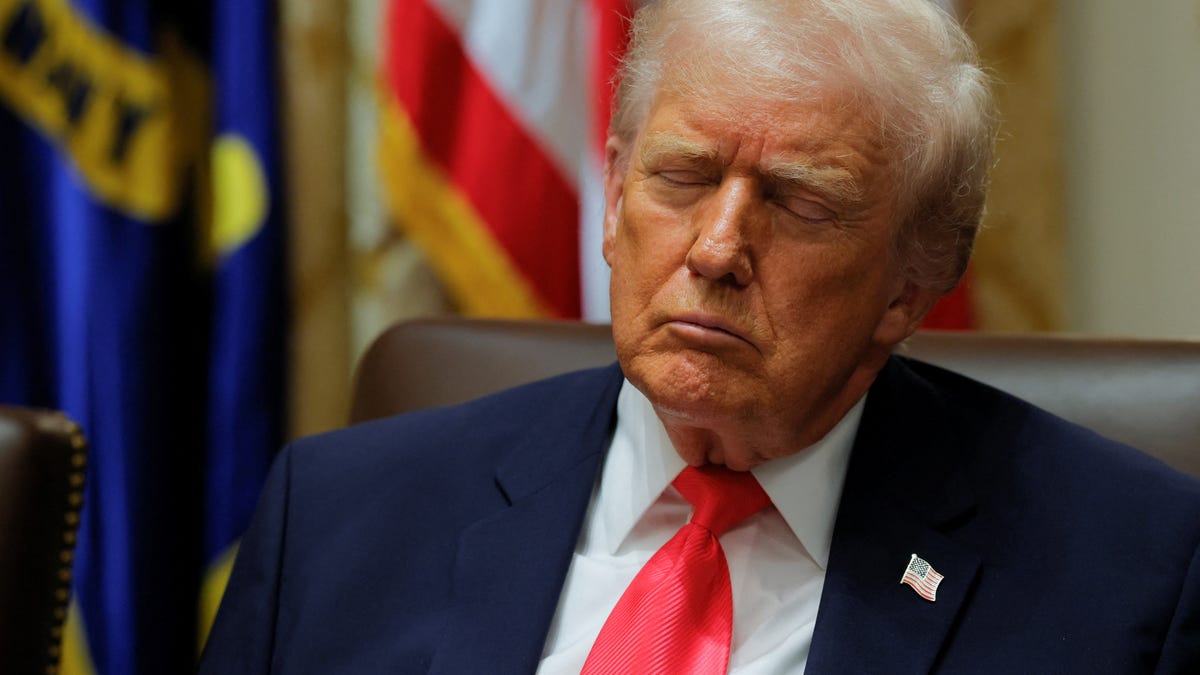 President Donald Trump attends a cabinet meeting at the White House in Washington, D.C., U.S., December 2, 2025.