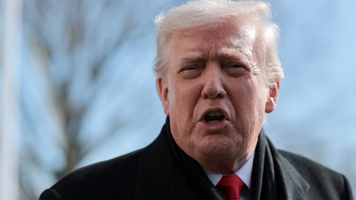 President Donald Trump speaks with the media as he heads to Marine One to travel to Iowa, from the White House in Washington, D.C., U.S., January 27, 2026.