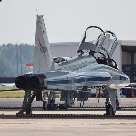 A NASA jet is parked at Ellington Airport in Houston, Texas, U.S., October 1, 2025. REUTERS/Evan Garcia