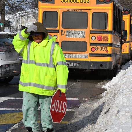 Buses at Vernon Hill Elementary School had to load students on one bus at a time due to lack of space from snow drifts.