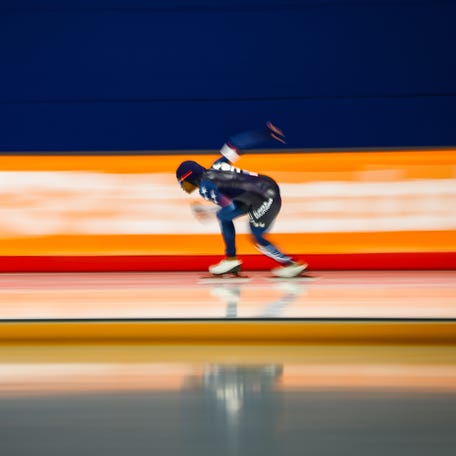 Nov 22, 2025; Calgary, Alberta, CANADA; Erin Jackson of USA competes in the women's 500m during the ISU Speedskating World Cup at Calgary Olympic Oval. Mandatory Credit: Sergei Belski-Imagn Images