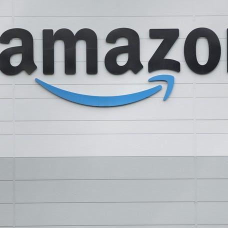 The logo of Amazon outside its fulfilment centre in Baldonnell Business Park in Dublin, Ireland, October 28, 2025.