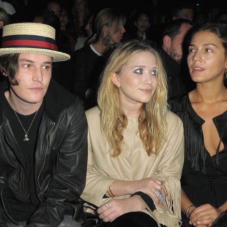 From left, Leigh Lezark, Max Winkler, Mary-Kate Olsen and Margherita Missoni attend the Giambattista Valli Pret a Porter spring/summer 2010 show during Paris Fashion Week at Jardin des Tuileries on Oct. 5, 2009.