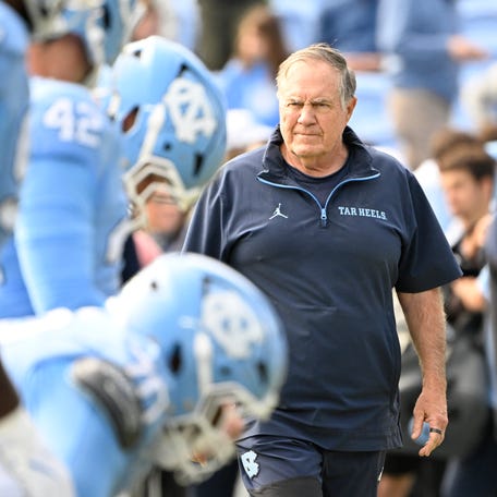 Oct. 25, 2025: Bill Belichick looks over the North Carolina Tar Heels football team before a game against Virginia at Kenan Stadium. The Tar Heels finished 4-8 in Belichick's first season as head coach.