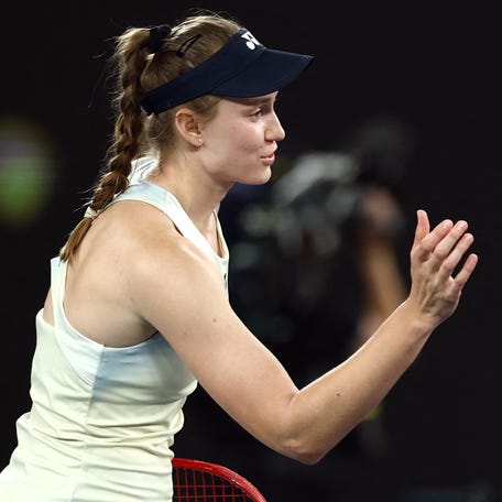 Kazakhstan's Elena Rybakina, left, shakes hands with Jessica Pegula of the U.S. after winning their semi final match at the 2026 Australian Open.