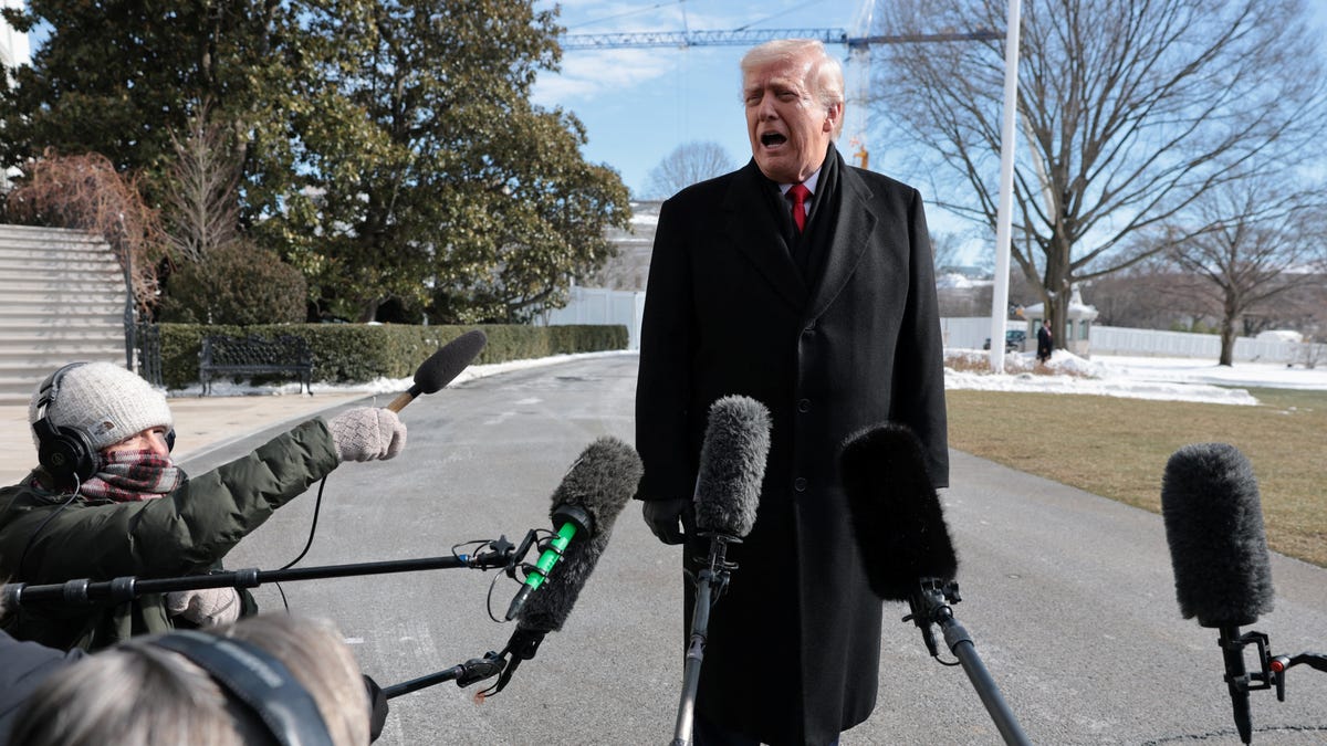 President Donald Trump speaks with the media as he heads to Marine One to travel to Iowa, from the White House in Washington, DC, on Jan. 27, 2026.