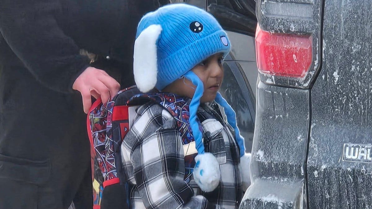 An ICE agent holds onto the backpack of a 5-year-old student at Valley View Elementary, Liam Conejo Ramos, as he is being detained on Jan 20, 2026, in Minneapolis, Minn. in this photo obtained on Jan. 23, 2026, courtesy of Columbia Heights Public Schools.