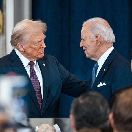 President Donald Trump, left, and outgoing President Joe Biden attend Trump's inauguration in Washington on Jan. 20, 2025.