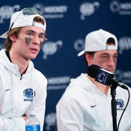 Penn State's Gavin McKenna, left, answers a question during a post-game press conference following a Big Ten hockey game against Michigan State at Beaver Stadium on January 31, 2026, in State College.