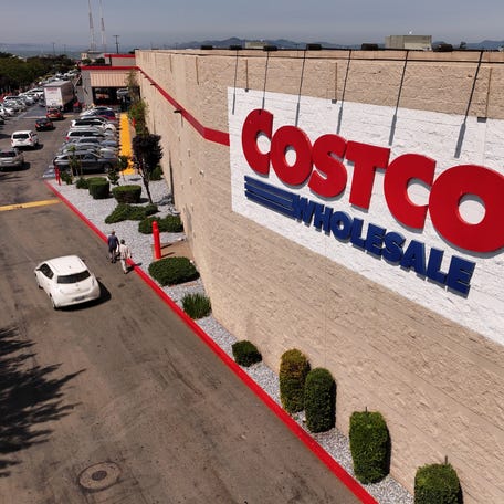In an aerial view, the Costco logo is displayed on the exterior of a Costco store on July 11, 2024, in Richmond, California.