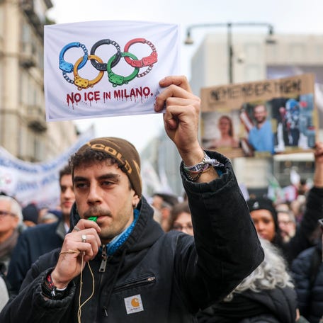 Demonstrators protest against deployment of ICE agents during the Milano Cortina 2026 Winter Olympics on January 31, 2026 in Milan, Italy. The US immigration agency whose officers were involved in a fatal shooting in Minneapolis says it will send agents to help with American security operations at the Winter Olympics in Italy, starting February 6.