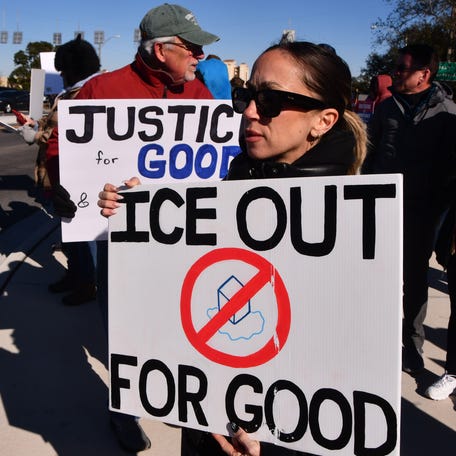 Protesters against Immigration and Customs Enforcement rally on Feb. 1, 2026, in Cocoa, Florida. Their signs refer to Renee Good, who was fatally shot by an ICE agent in Minneapolis.