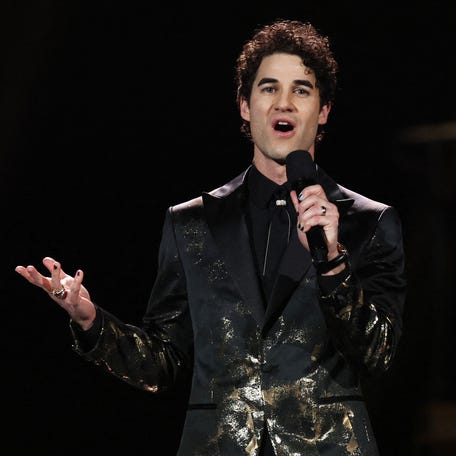 Darren Criss speaks onstage during the premiere ceremony of the 68th Annual Grammy Awards in Los Angeles.