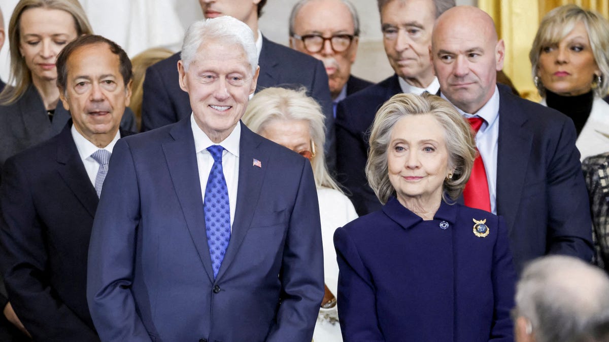 FILE PHOTO: Former U.S. President Bill Clinton and former U.S. Secretary of State Hillary Clinton arrive for Donald Trump's inauguration as the next President of the United States in the Rotunda of the United States Capitol in Washington, on Jan. 20, 2025.