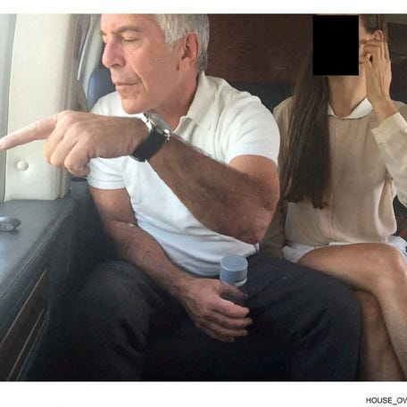 Late financier and convicted sex offender Jeffrey Epstein appears with a companion, whose identity has been obscured, in this image from the Epstein estate released by the Democratic members of the House Committee on Oversight and Reform in Washington, DC, on Dec. 18, 2025.