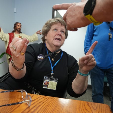 Director Casey Rollins talks with volunteers during a chaotic morning at the St. Vincent De Paul Society, 228 Raffensperger Ave,, in Springfield, Ohio on Feb 3, 2026. Springfield is home to one of the largest Haitian immigrant communities in the Midwest and a focal point of national political rhetoric.
