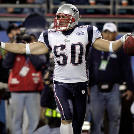 New England Patriots linebacker Mike Vrabel reacts after scoring a touchdown against the Philadelphia Eagles during Super Bowl XXXIX at Alltel Stadium. The Patriots won the game 24-21.