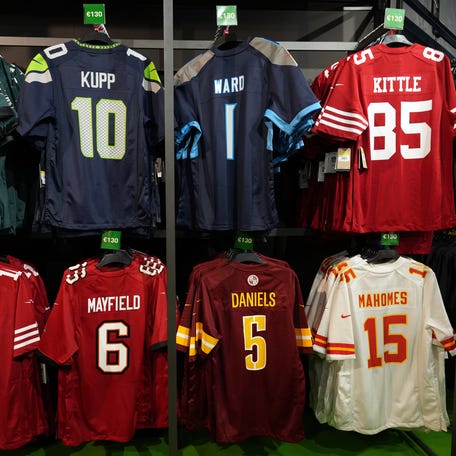 Nike jerseys of various players at the NFL Shop at the St. Stephen's Green Shopping Centre in Dublin, Ireland.