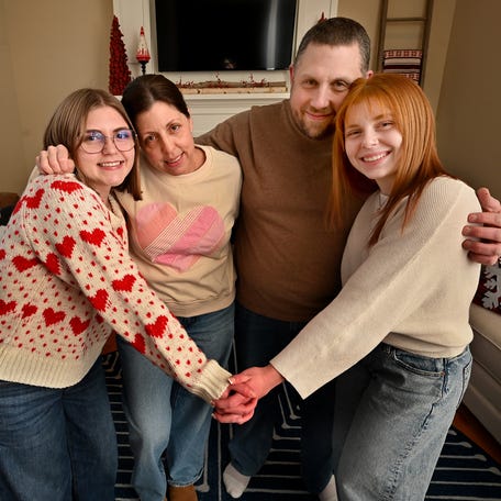 Adelaide Greenwald of Uxbridge, left, with her mother, Alexa Romasco, father, Jared Greenwald, and sister, Zophie Greenwald. Adelaide had surgery to fill a hole in her heart, a condition called patent foramen ovale.