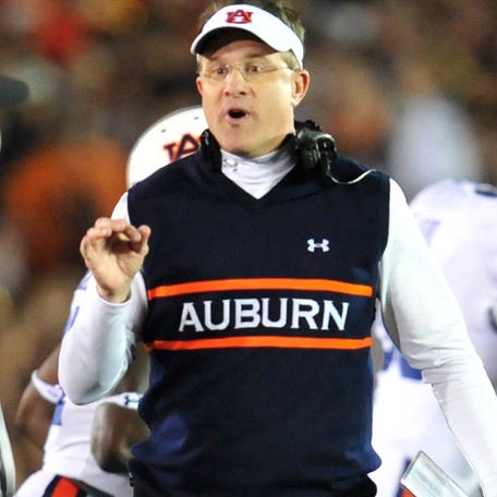 Auburn football coach Gus Malzahn talks to an official during the Bowl Championship Series national championship game against Florida State at the Rose Bowl on Jan. 6, 2014.