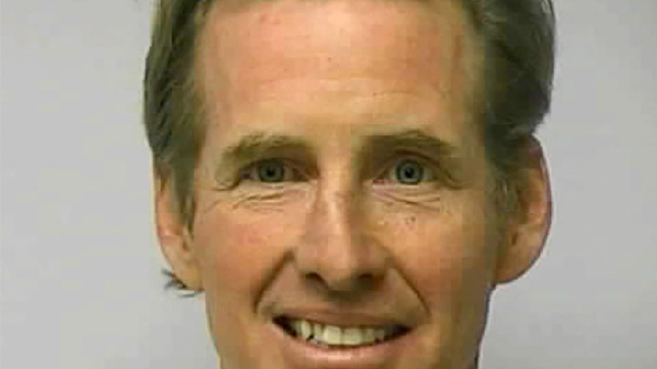 Ryan W. Routh poses in a jail booking photograph in Greensboro, North Carolina, U.S. February 10, 2010.