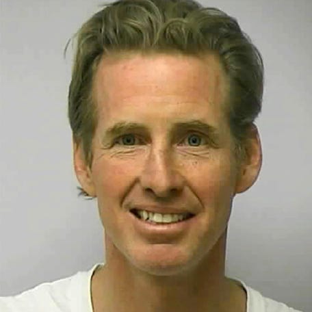 Ryan W. Routh poses in a jail booking photograph in Greensboro, North Carolina, U.S. February 10, 2010.