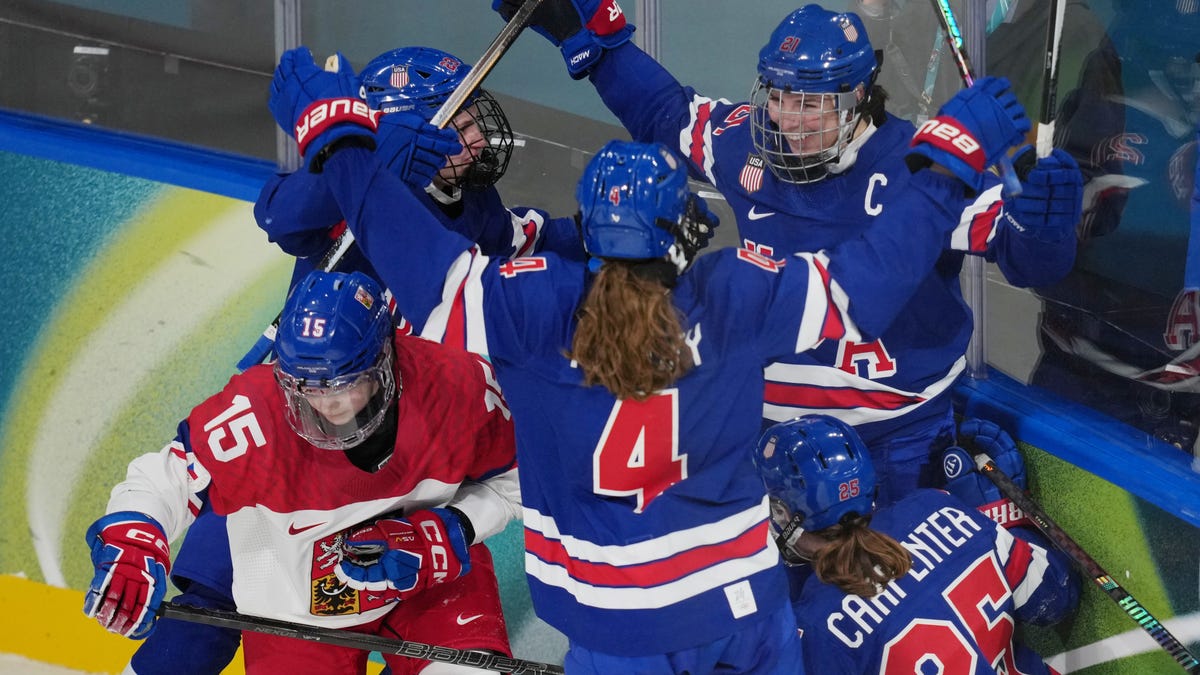 Team USA's Hilary Knight (21) celebrates with teammates after scoring a goal against Czechia in the second period.