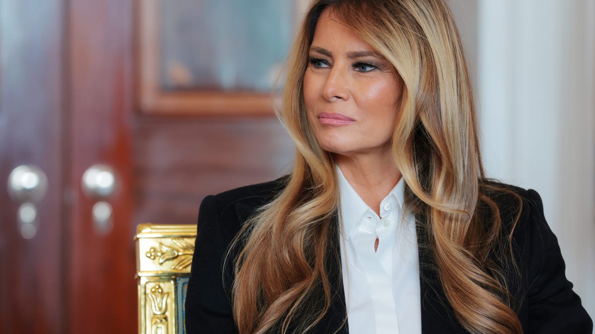 First lady Melania Trump speaks during a meeting with Keith Siegel and Aviva Siegel in the Blue Room of the White House on Feb. 4, 2026, in Washington, DC.