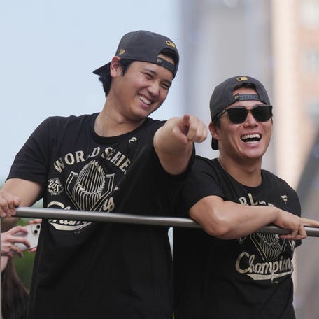 Shohei Ohtani and Yoshinobu Yamamoto at the Dodgers' championship parade.