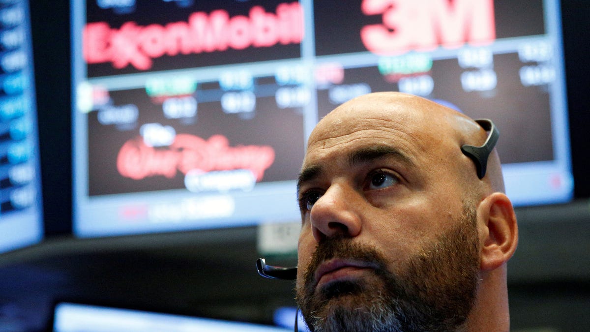FILE PHOTO: A trader works on the floor of the New York Stock Exchange (NYSE) in New York City, U.S., September 15, 2016. REUTERS/Brendan McDermid/File Photo