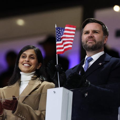 U.S. Vice President JD Vance and Second lady Usha Vance wave American flags during the opening ceremony during the Milano Cortina 2026 Olympic Winter Games in Milan, Italy on Feb. 6, 2026.