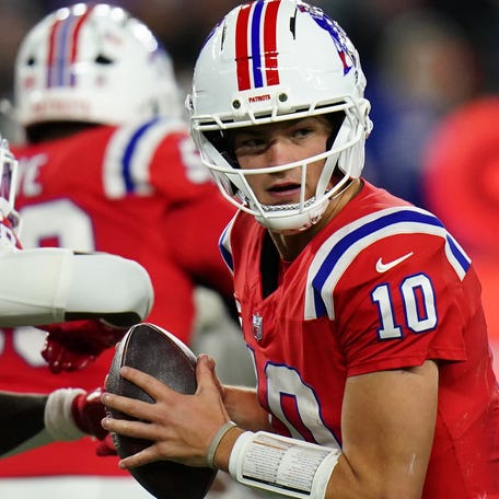 Dec 1, 2025; Foxborough, Massachusetts, USA; New England Patriots quarterback Drake Maye (10) fakes a hand off during the fourth quarter against the New York Giants at Gillette Stadium. Mandatory Credit: David Butler II-Imagn Images