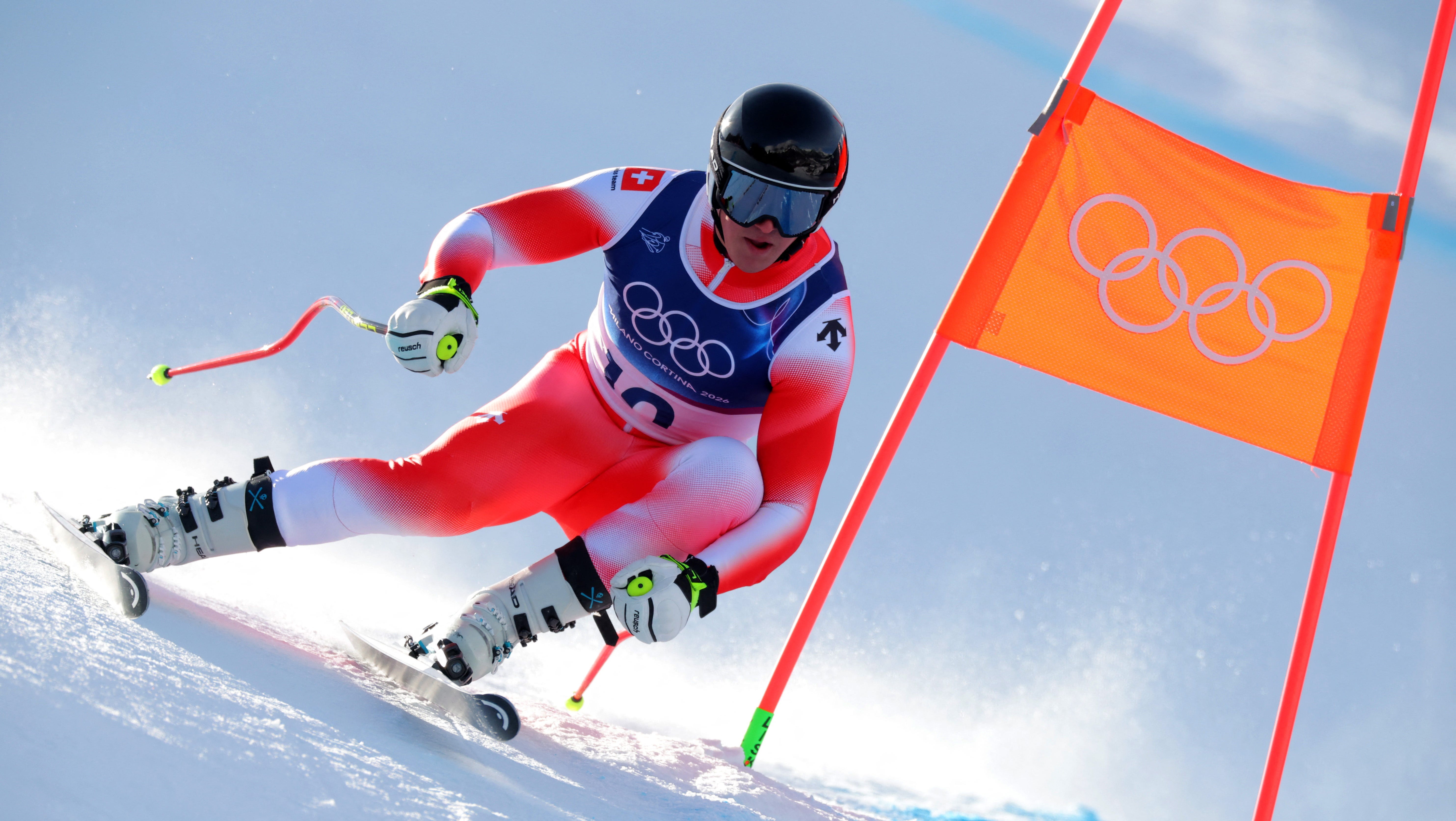 The first medals of the 2026 Winter Olympics have been awarded. See who won gold, silver and bronze in men's downhill skiing.