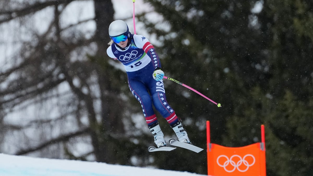 Lindsey Vonn races down the course during a training session for the women's downhill at the Milano Cortina Winter Olympics on Feb. 7, 2026.