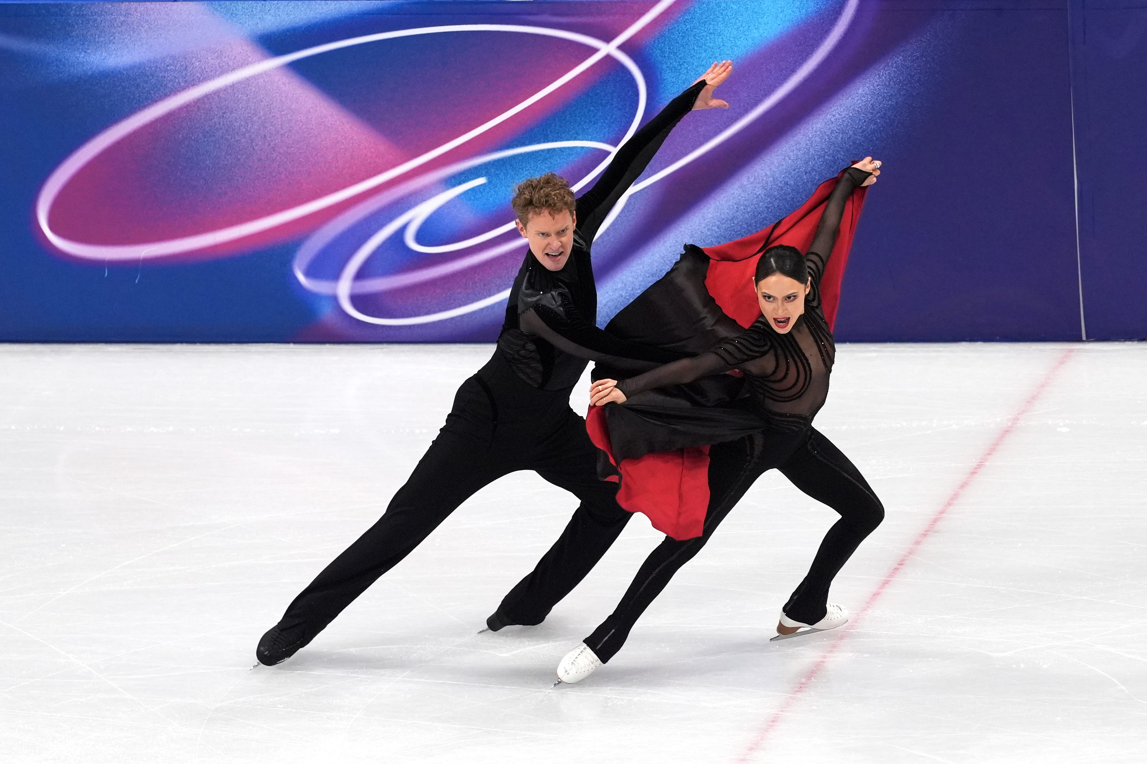 Ilya Malinin clinched an Olympic gold for the U.S. in the team figure skating event on Sunday, giving Madison Chock and Evan Bates their 2nd gold.