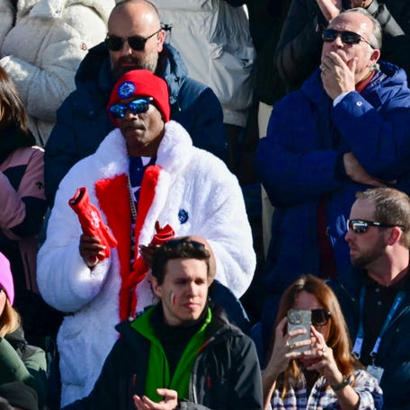 Snoop Dogg reacts after United States skier Lindsey Vonn crashed in the women's downhill event at the 2026 Winter Olympic Games at the Tofane Alpine Skiing Centre in Cortina d'Ampezzo on Feb. 8, 2026.