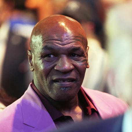 Mike Tyson, near President Donald Trump, attends the UFC-316 mixed martial arts event, at the Prudential Center, Saturday, June 7, 2025, in Newark, N.J.