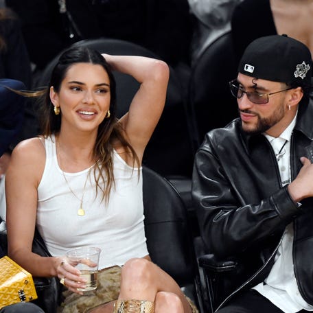 Kendall Jenner and Bad Bunny attend the Western Conference Semifinal Playoff game between the Los Angeles Lakers and Golden State Warriors at Crypto.com Arena on May 12, 2023 in Los Angeles.