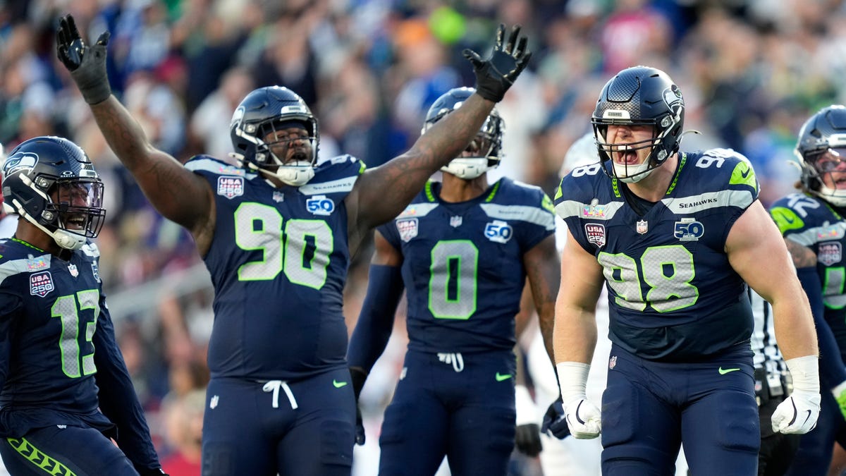 Seattle Seahawks defensive tackle Rylie Mills (98) reacts after sacking New England Patriots quarterback Drake Maye (10) during the second quarter in Super Bowl LX at Levi's Stadium.