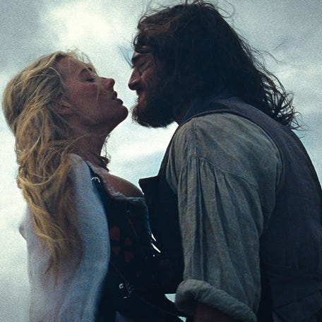 Childhood friends Cathy (Margot Robbie) and Heathcliff (Jacob Elordi) begin a lustful love affair after she gets married and he returns after many years away in "Wuthering Heights."