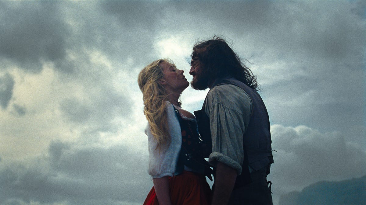 Childhood friends Cathy (Margot Robbie) and Heathcliff (Jacob Elordi) begin a lustful love affair after she gets married and he returns after many years away in "Wuthering Heights."
